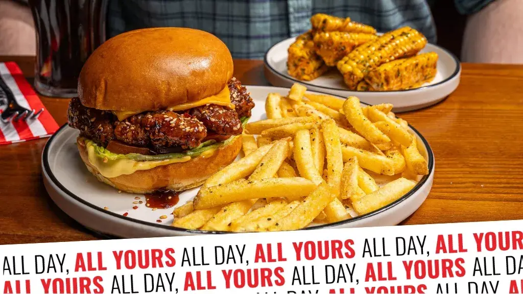 A buttermilk chicken burger and fries on a plate